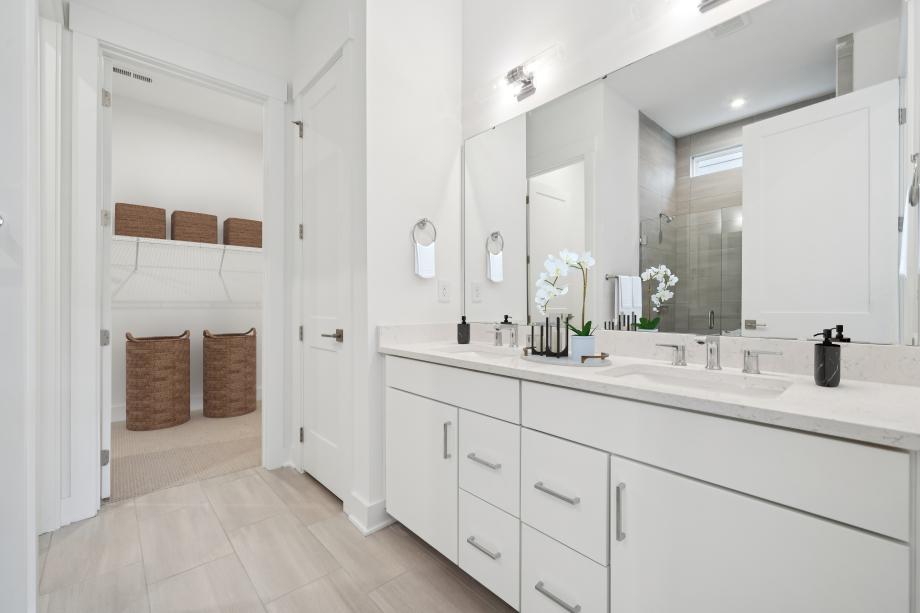 Spa-like primary bathroom with dual sinks