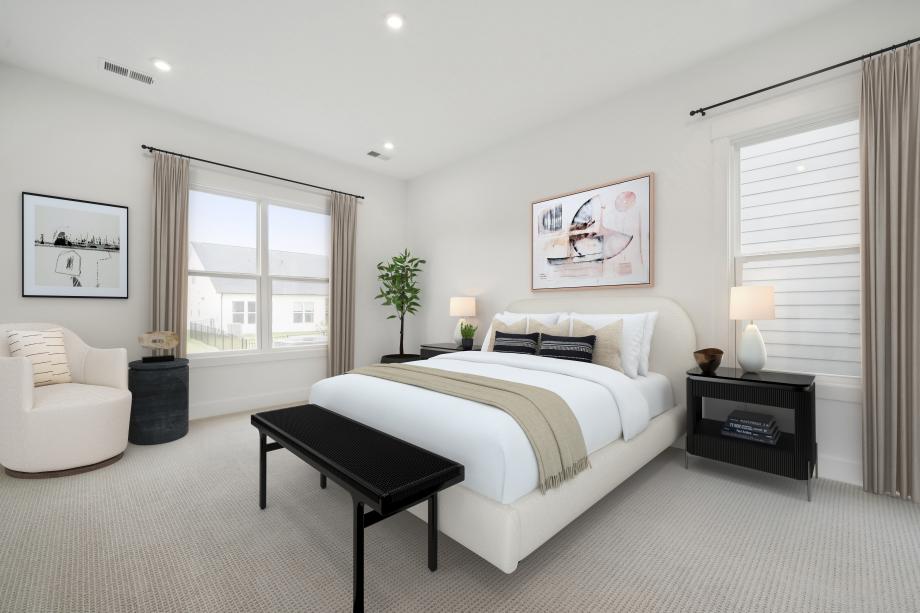 Primary bedroom with seating area