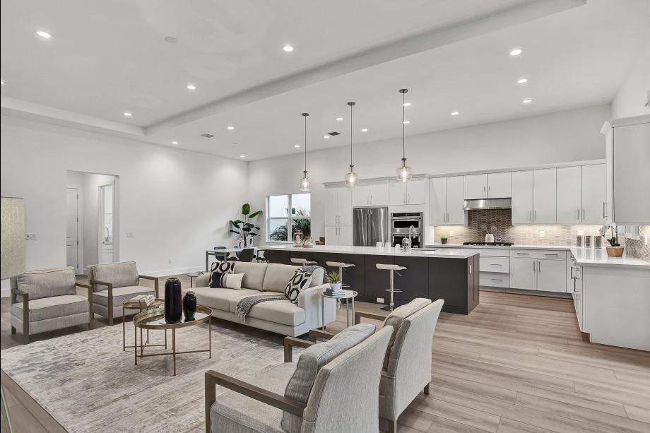 Expansive living area flowing effortlessly to dining and kitchen spaces