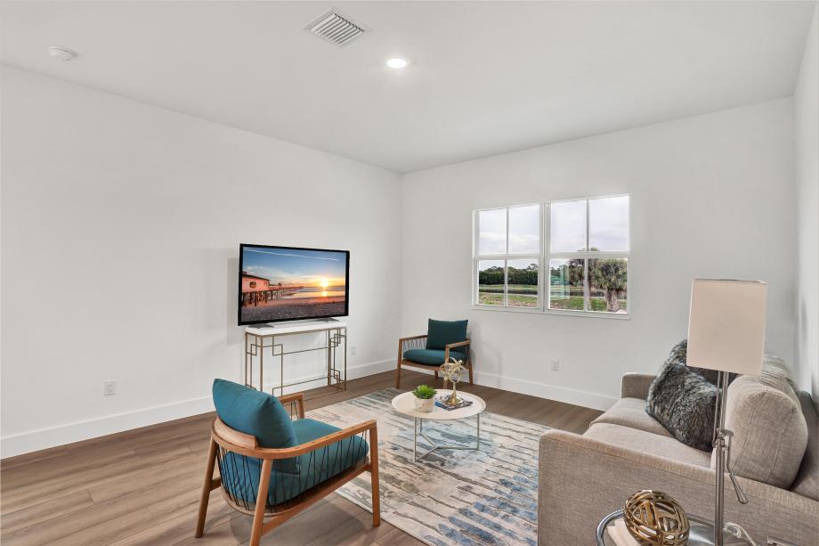 Secondary loft view highlighting generous seating and natural light