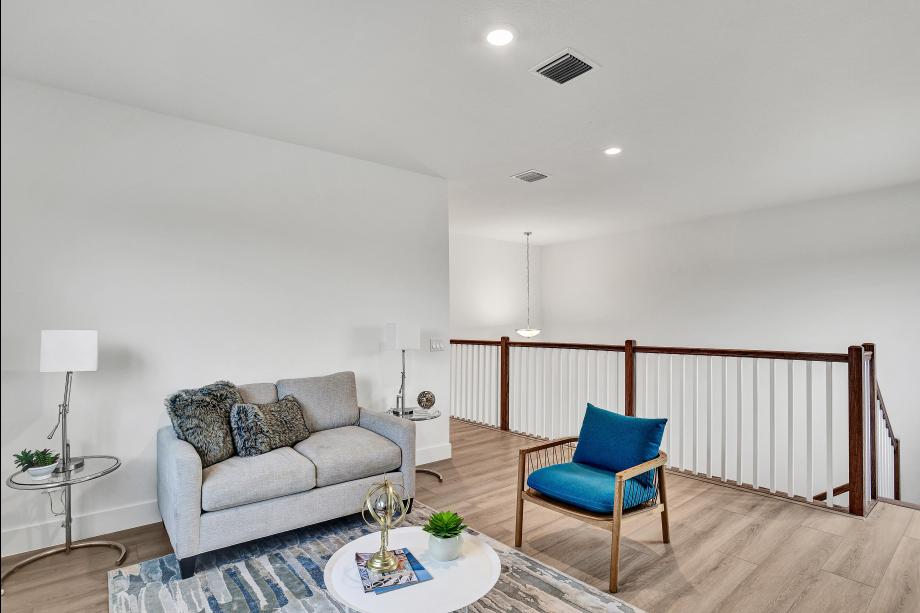 Flexible loft space perfect for lounging, media, or working from home