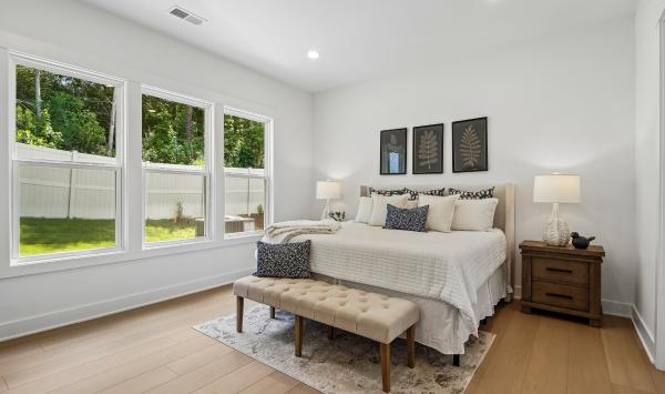 Tucked away primary bedroom suite