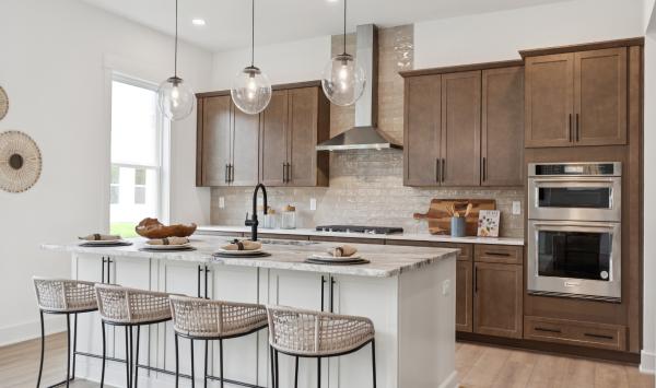 Well thought out kitchen with two-toned cabinets