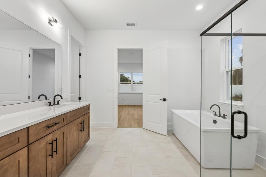 Primary bathroom with matte black finishes