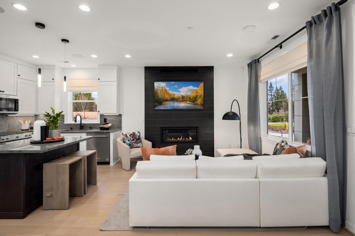 Open floor plan feature a cozy gas fireplace