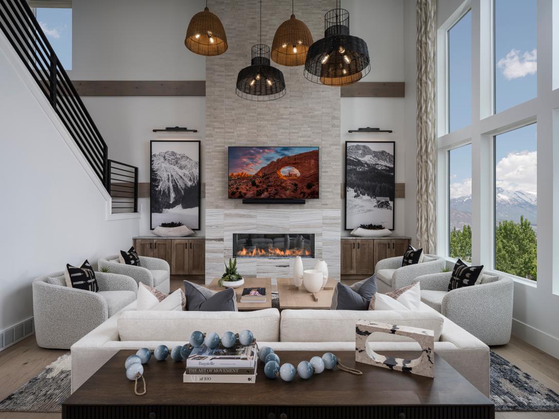 Soaring ceilings in great room with ample natural light