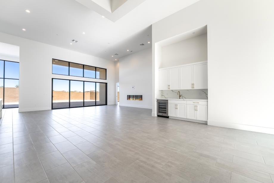 Great room features sleek linear fireplace