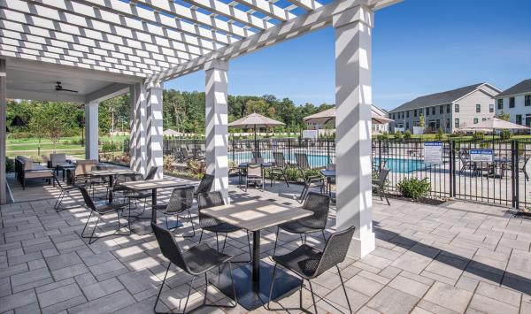 The covered terrace is the perfect spot to relax on sunny summer days