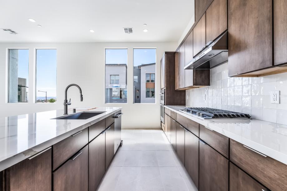 Upgraded kitchen hard surface and tiled backsplash