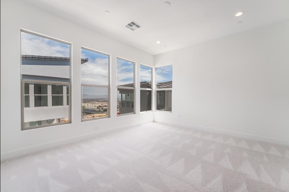 Impressive primary bedroom suite