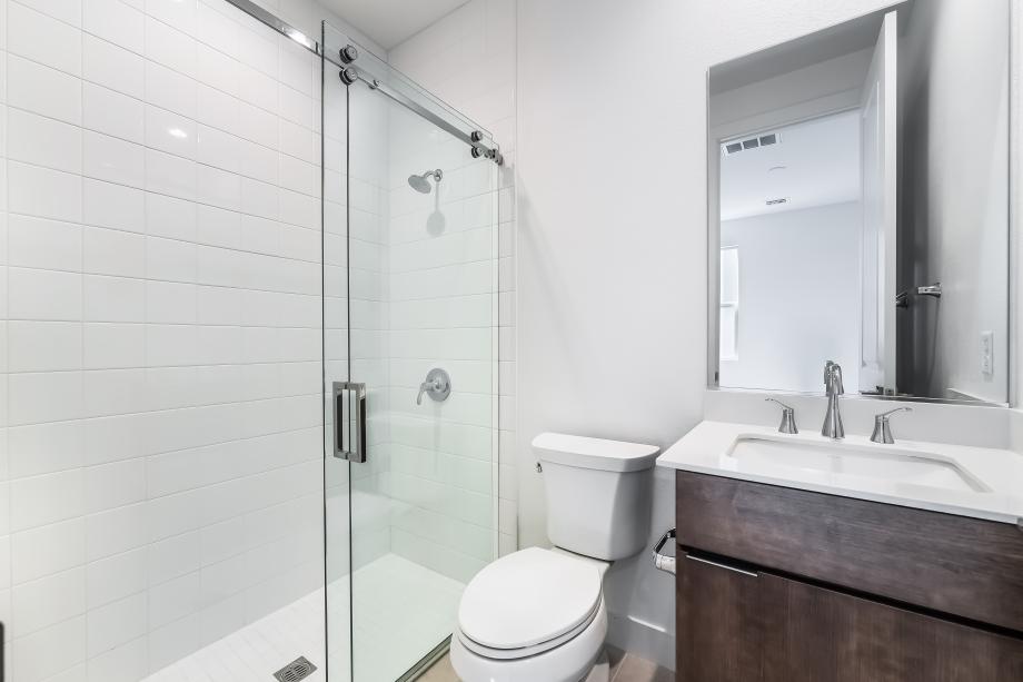 Full first-floor bath with tile surround shower