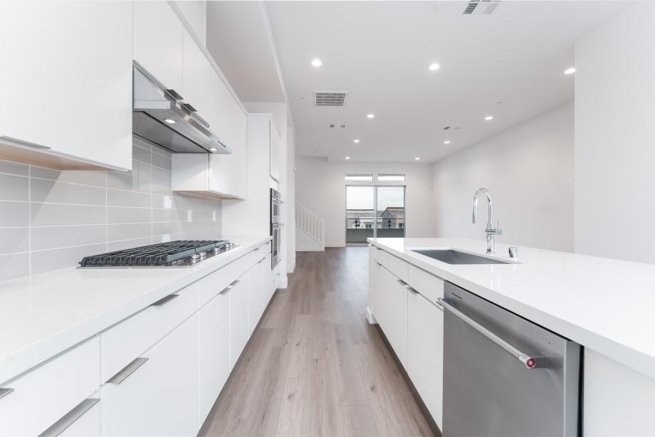 Upgraded kitchen hard surface and tiled backsplash