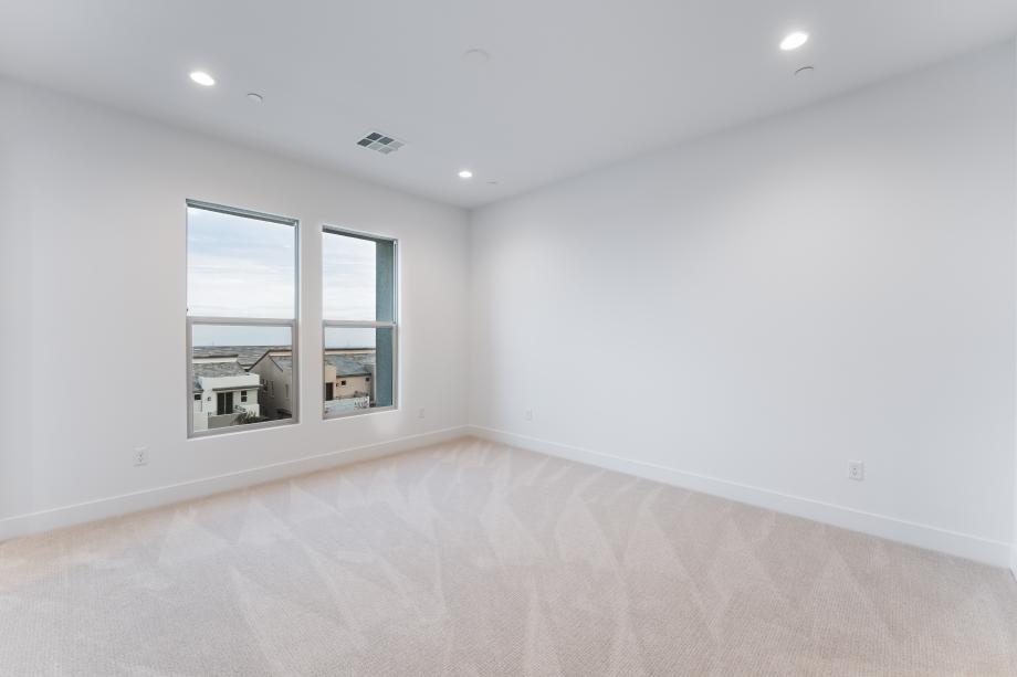 Impressive primary bedroom suite