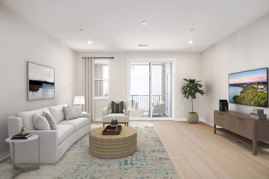 Representative Photo - Great room with adjacent outdoor living on the balcony