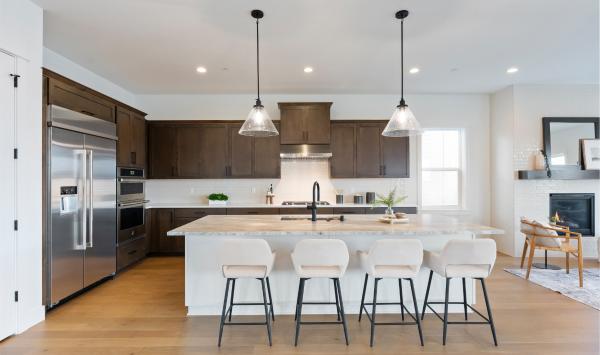 Open-concept kitchen with large island and a breakfast bar