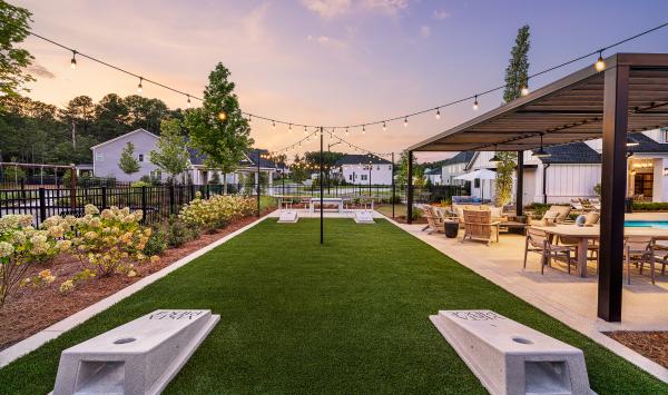 Play a game of cornhole