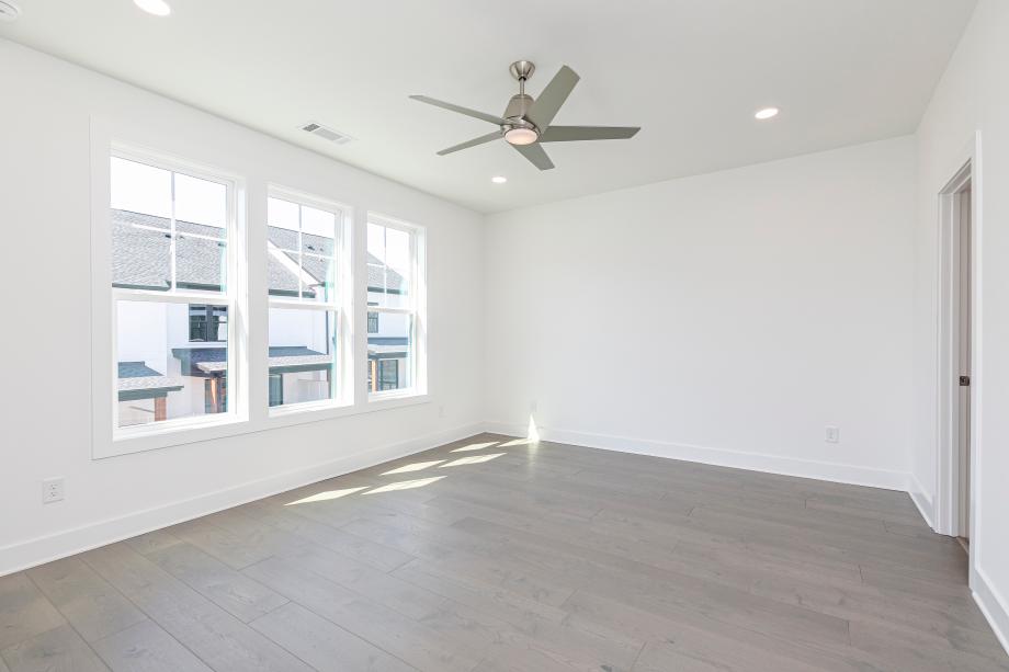 Cozy and inviting primary bedroom suite