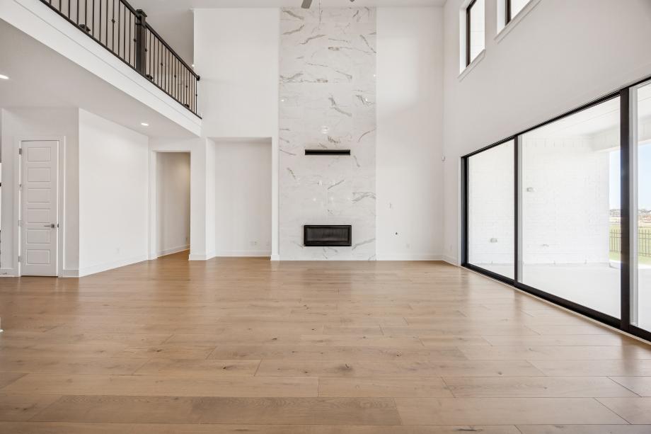 Expansive great room with a multi-slide door