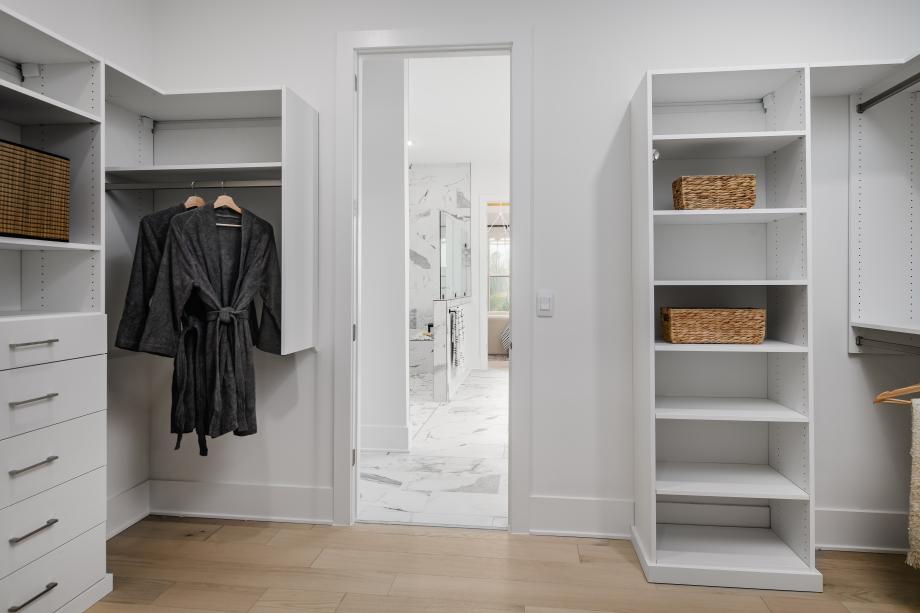 Premium walk-in closet with connectivity to the laundry room