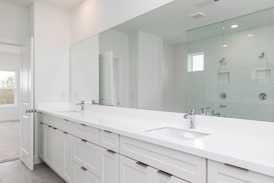 Primary bath with luxe shower and soaking tub