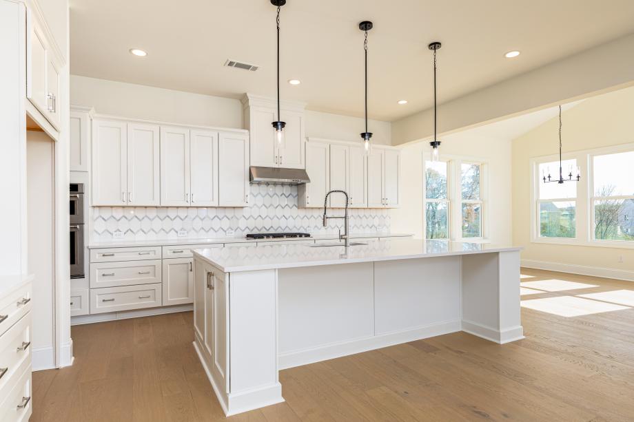 Kitchen flows seamlessly into the casual dining area perfect for family meals
