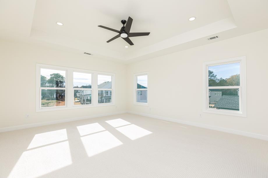 Expansive primary bedroom suite