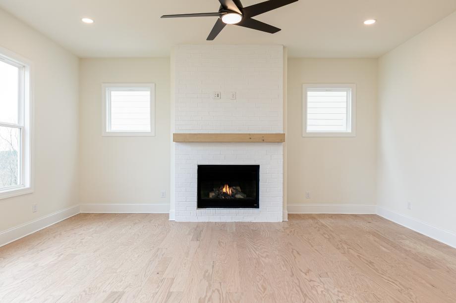 Fireplace anchors the great room