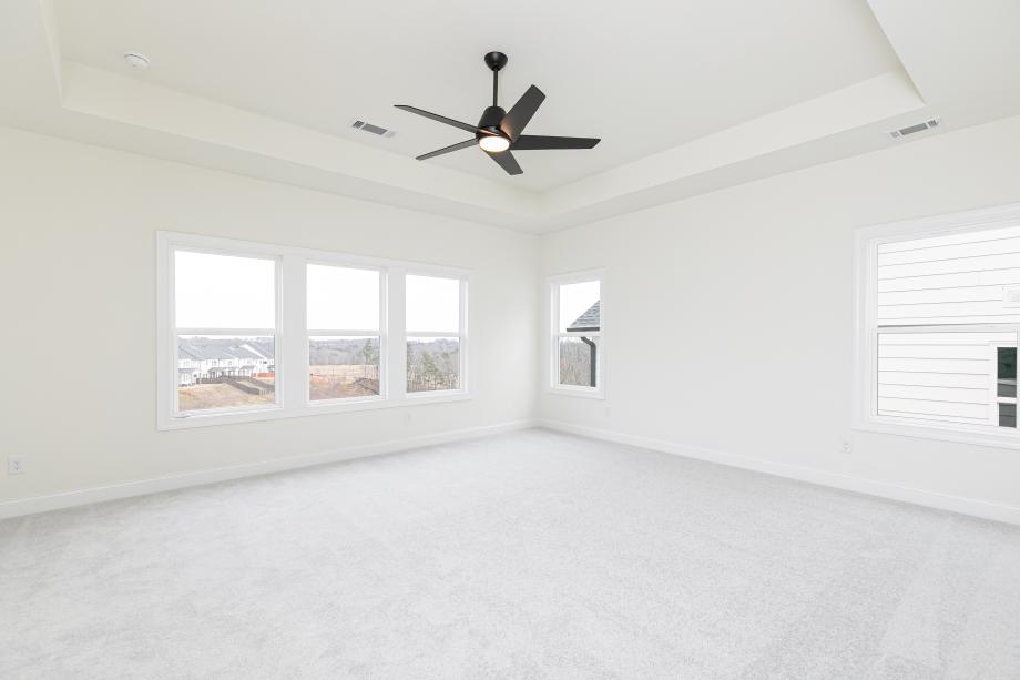 Expansive primary bedroom suite