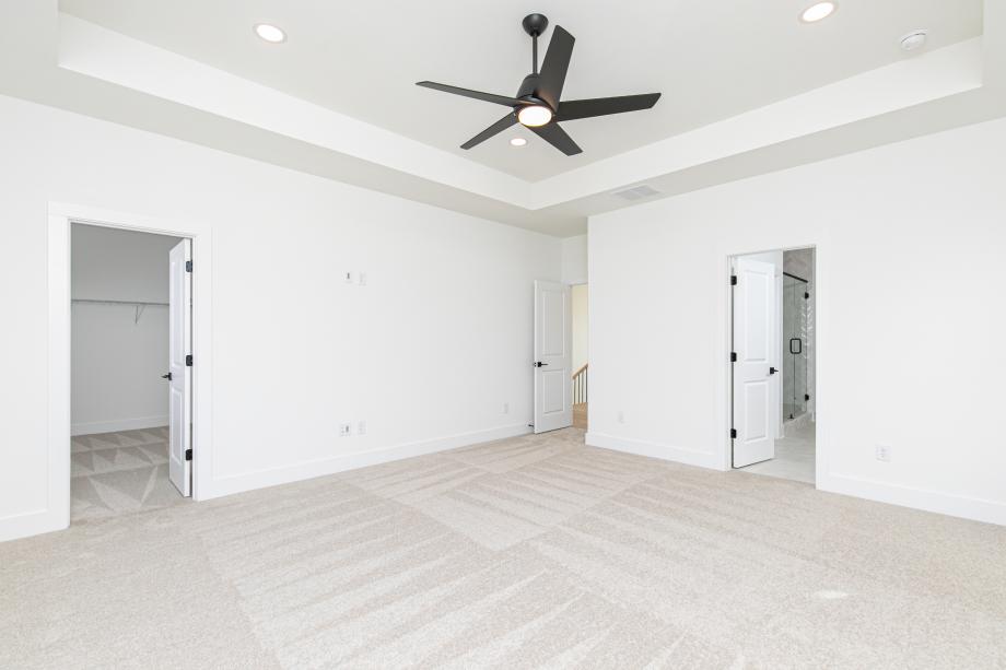 Spacious primary bedroom suite