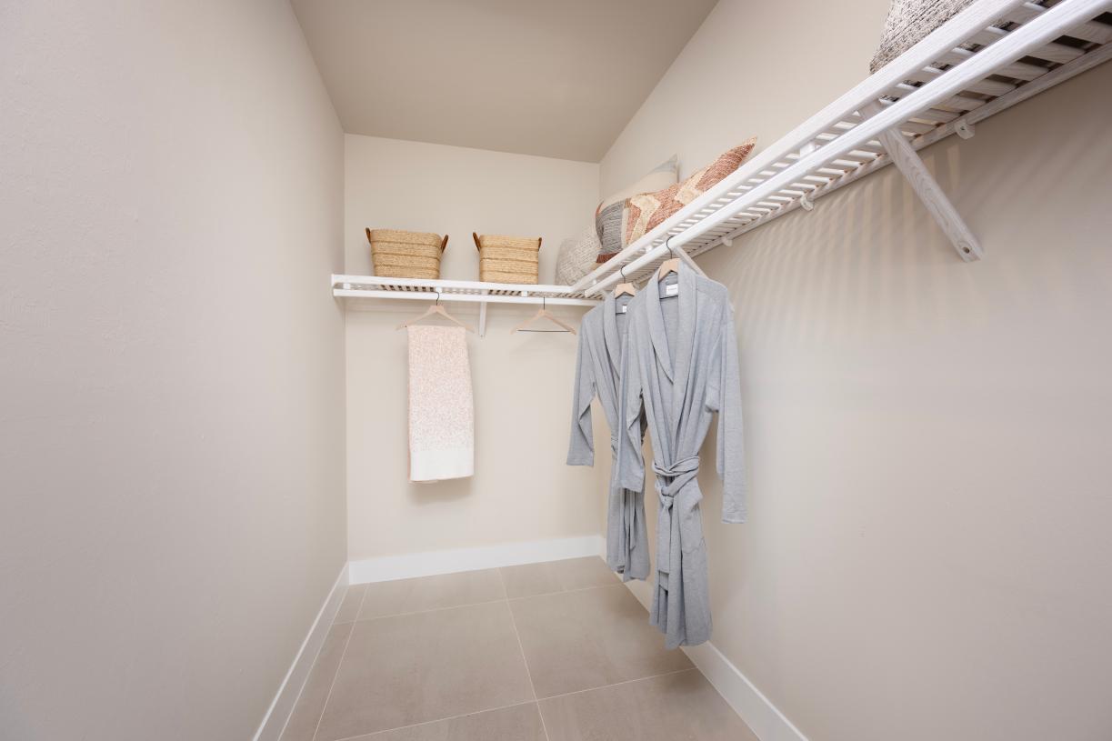 Spacious primary walk-in closets