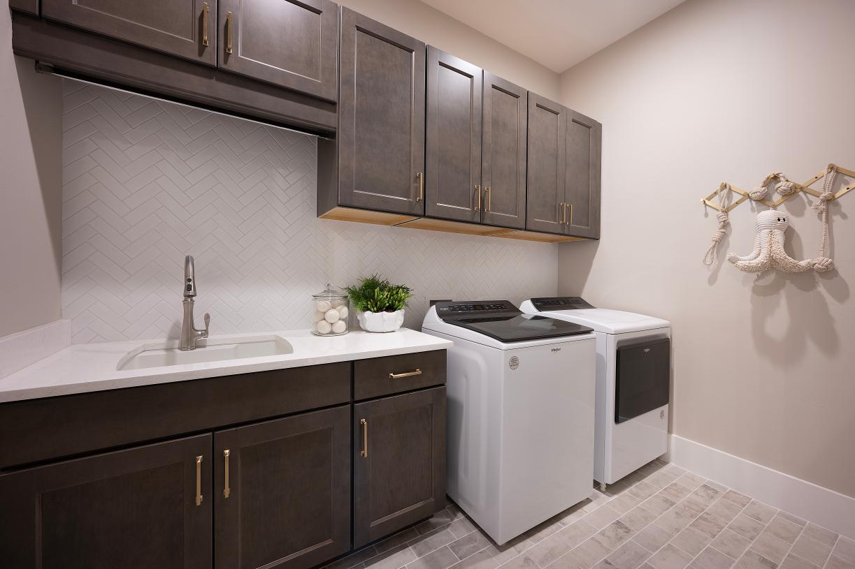 Convenient laundry rooms with optional sink and added storage