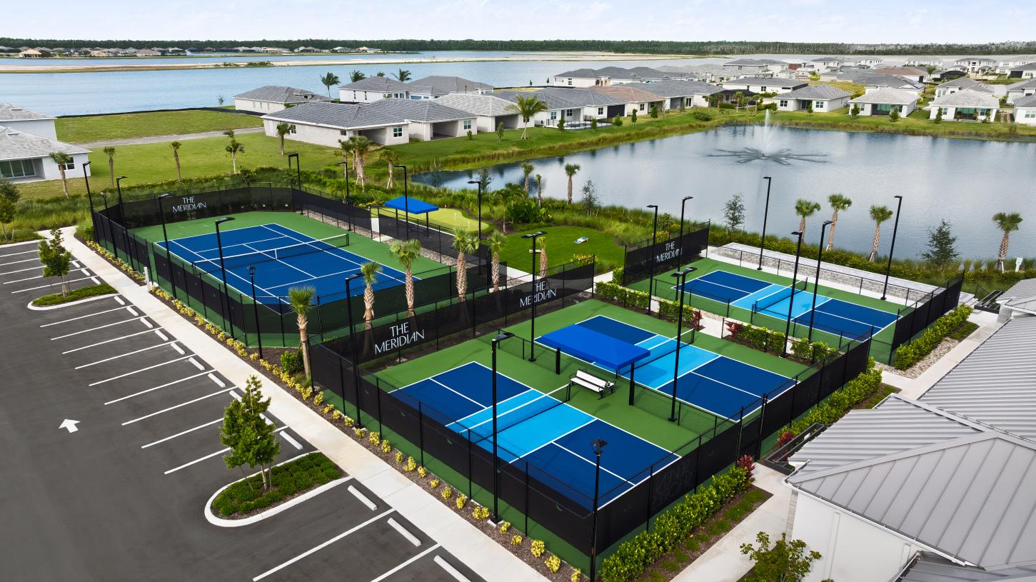 Tennis and Pickleball courts with nearby putting green and game lawn