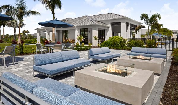 Beautifully designed outdoor retreat with seating and fire pit