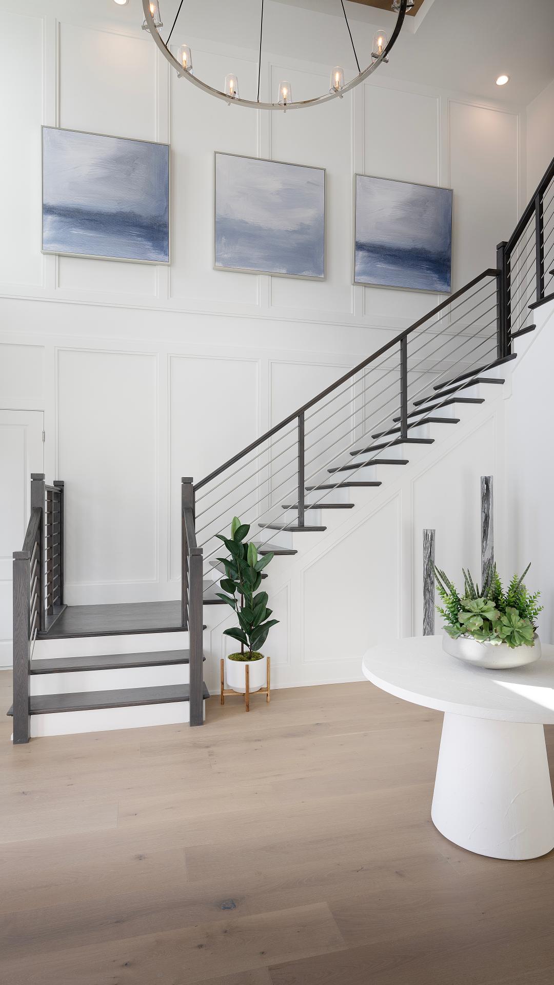 Welcoming entry foyers with two-story ceilings and views to the great room