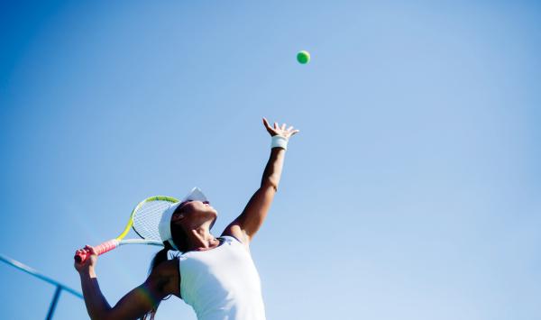 Enjoy a competitive match at the tennis courts with your neighbors