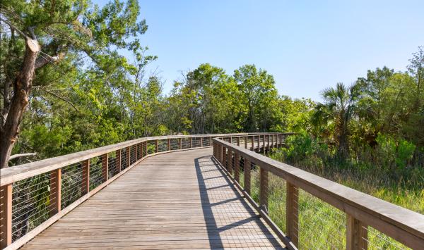 An elegant extension of the Riverwalk, blending nature with tranquility