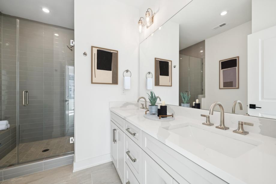 Serene primary bathroom with dual sinks