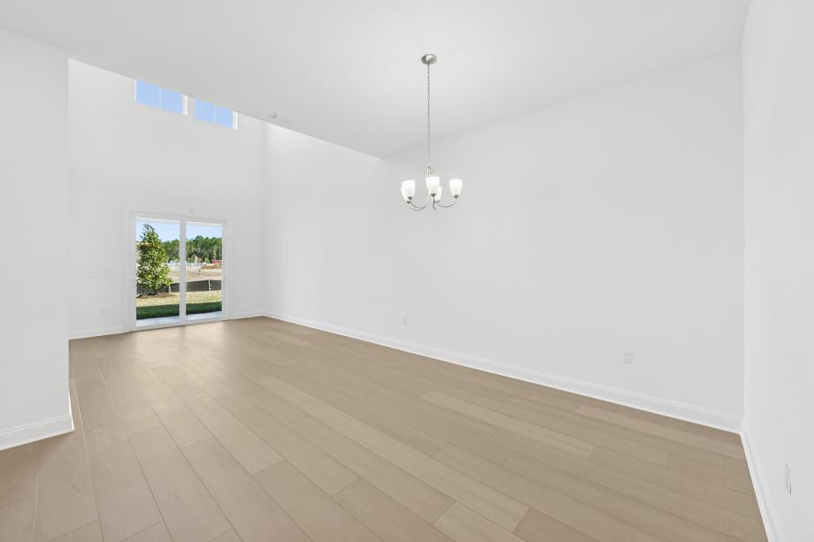 Open-concept floor plan with a casual dining area adjacent to the kitchen