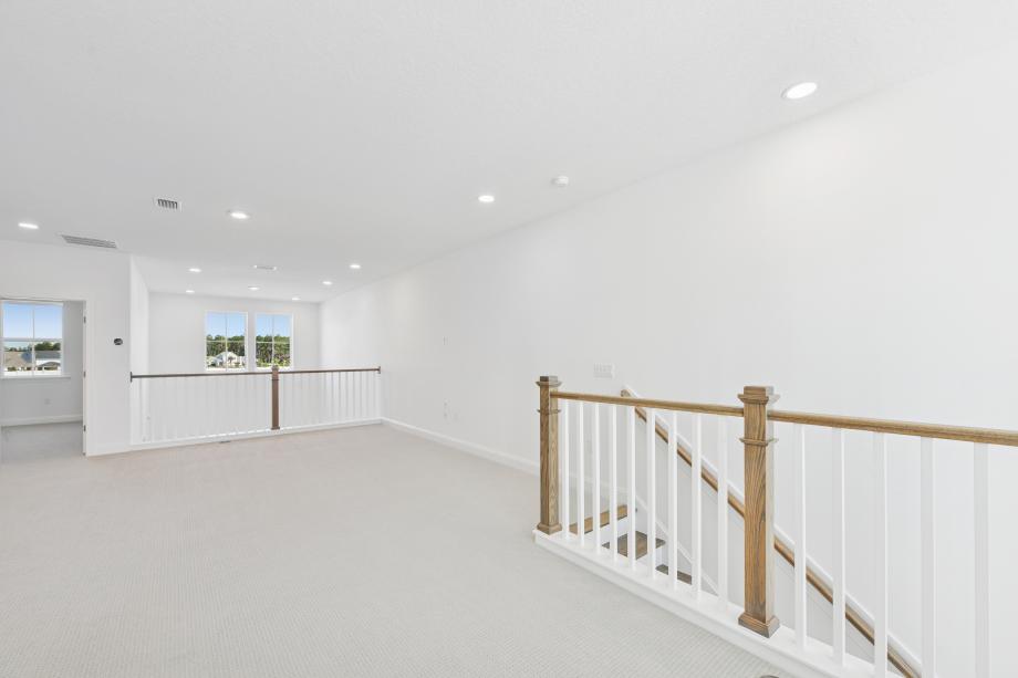 Second-floor loft ideal for secondary entertaining space