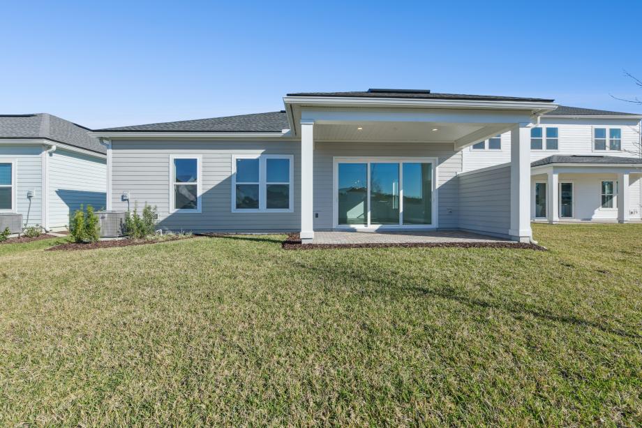 Rear exterior with a large covered lanai