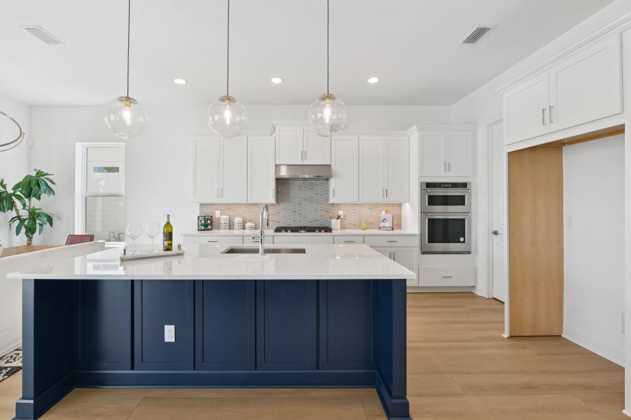 Impressive kitchen with white cabinets and ample countertop space