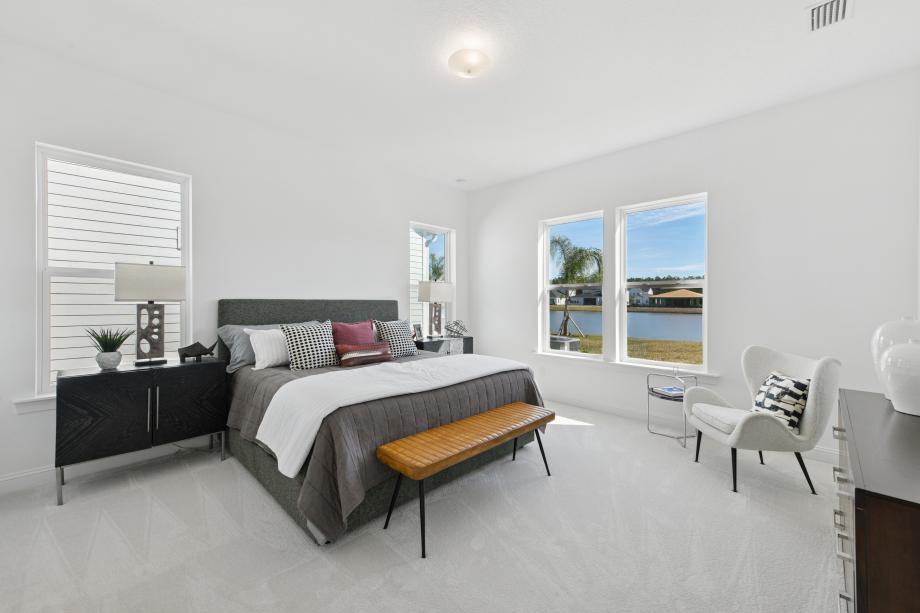 Spacious primary bedroom suite with ample natural lights