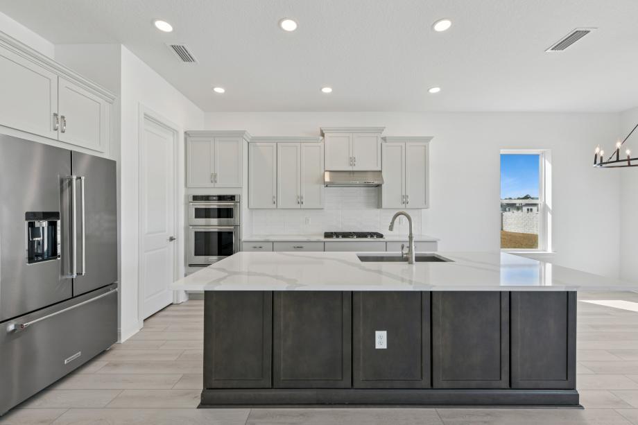 Well-equipped kitchen with beautiful cabinets and ample countertop space