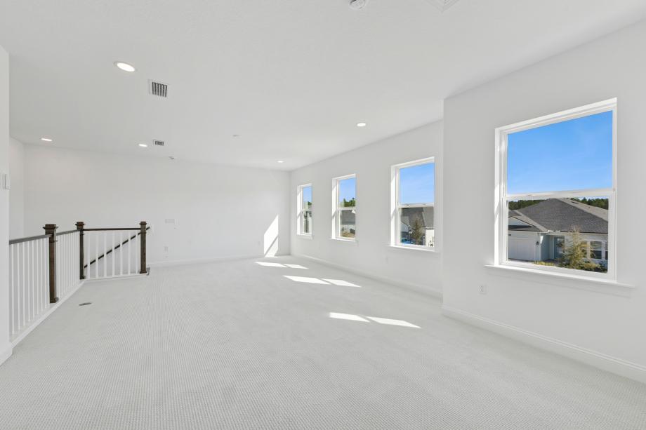 Second-floor loft ideal for secondary entertaining space