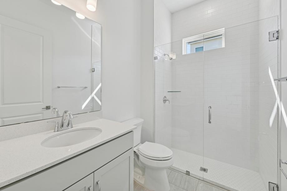 Secondary bathroom with a beautiful walk-in shower