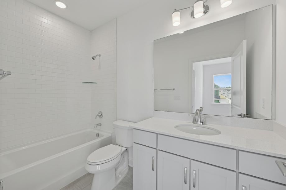 Secondary bathroom with a tub/shower combo