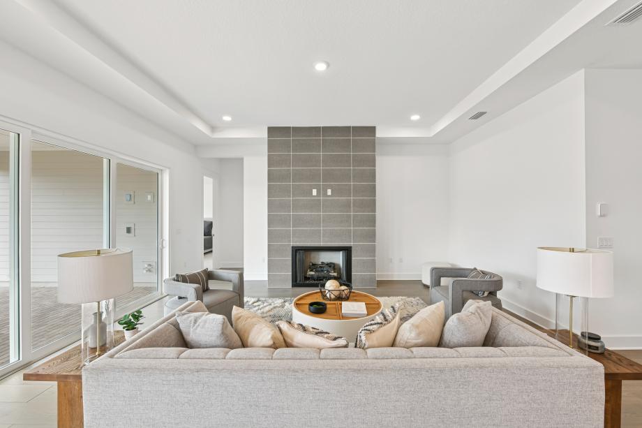 Cozy great room with multi-sliding glass door connecting indoor-outdoor living