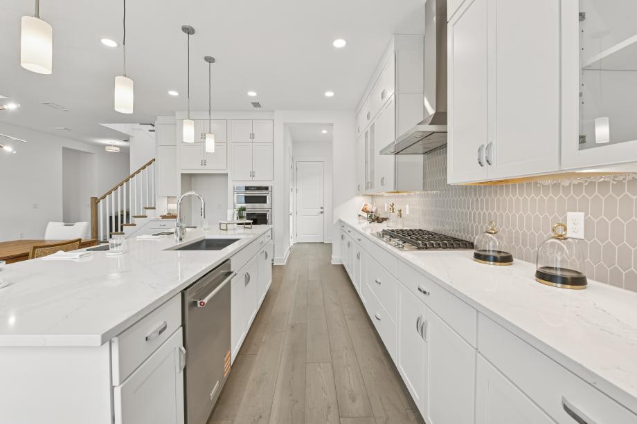 Large center island and stainless steel appliances