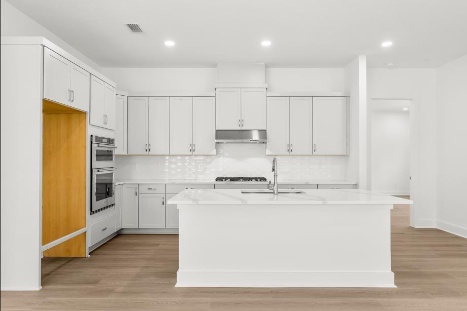 Well-equipped kitchen with beautiful cabinets and ample countertop space