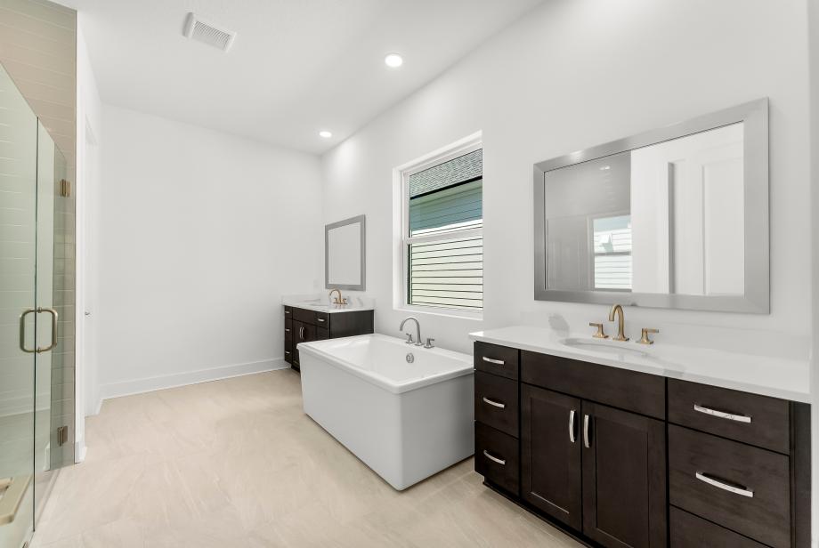 Spa-like primary bathroom with a large walk-in shower